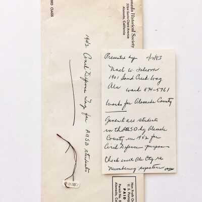 Envelope, tag, and note