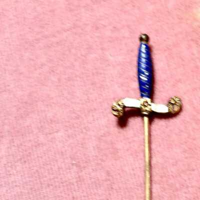 Sword-grip shaped Hat pin with blue & white enamel, early 1900s