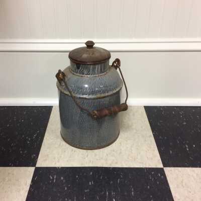 Grey speckled graniteware milk can from the basement of 2849 Jackson Street, c. 1900