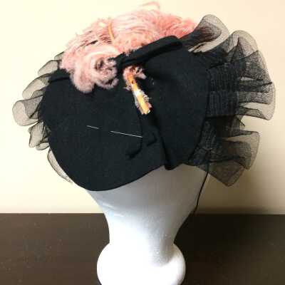 Black felt cocktail hat with coral ostrich feathers and black net, c. 1940s