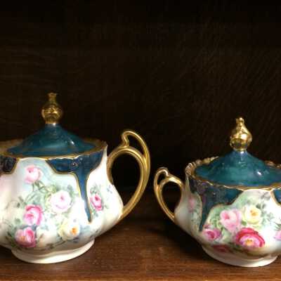 Teapot and sugar bowl hand-painted by Elizabeth Thomas, early 1900s