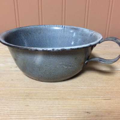 Graniteware cup with applied handle