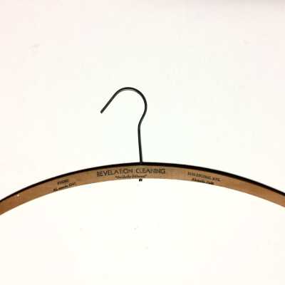Wooden hanger advertising Revelation Cleaning, c. 1930s-1940s