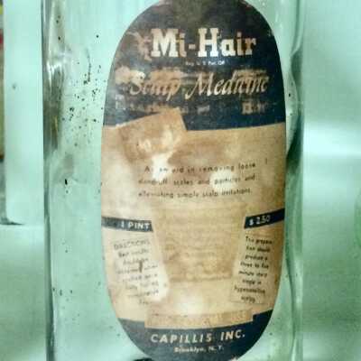 Glass Bottle of MI-Hair Scalp Medicine, early 1940s