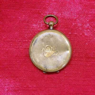 Locket with photo portraits of Mr. and Mrs. Abel Thornton, c. 1860s