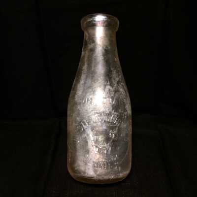 Western Dairy Quart milk bottle dug up from the City Dump, c. 1920s