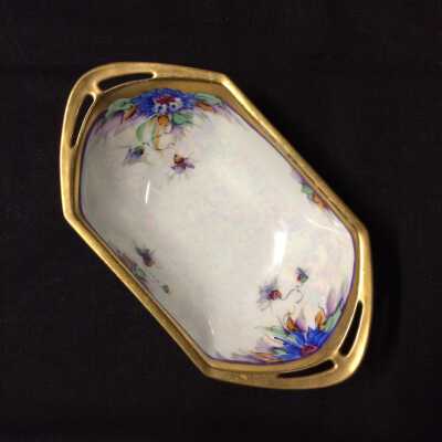 Porcelain candy dish with pierced handles, and flowers painted by Jorgensen, c. 1930