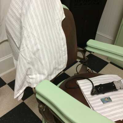 White linen duster used at Frank's barber shop, 1960s-1970s