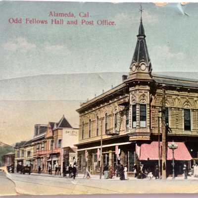 Postcard Odd Fellow building and John Durein Shoe Store, c. 1906