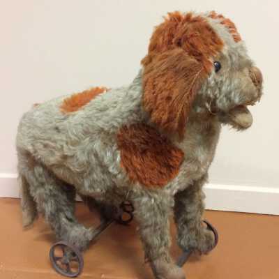 Stuffed dog on wheels, c. 1910