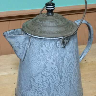 Graniteware coffeepot of molten grey & white enamel, before 1920