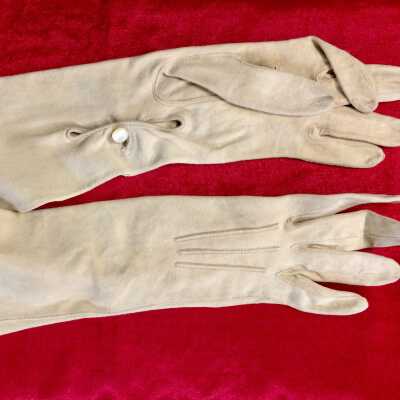 Pair of cream suede gloves with a mother-of-pearl button