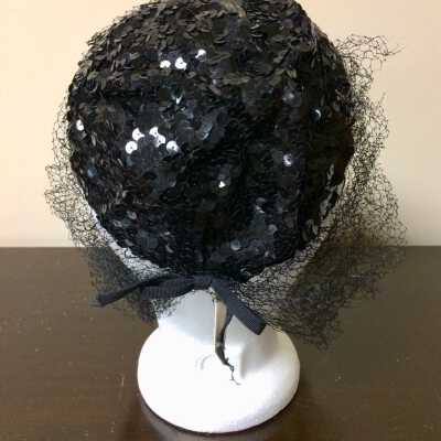 Black sequin cloche evening hat with veil and bow, c. 1950s