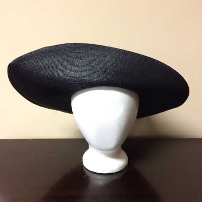 Pseudo tri-corne hat of black straw, c. 1915 to 1920