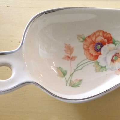 Neptune Palace Theatre give-away China Flour Scoop, 1930s
