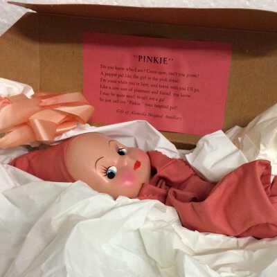 Pinkie handpuppet with box, ca. 1940s-1950s