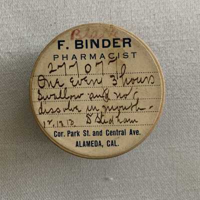 Black cardboard Pill Box from F. Binder Pharmacist, early 1900s