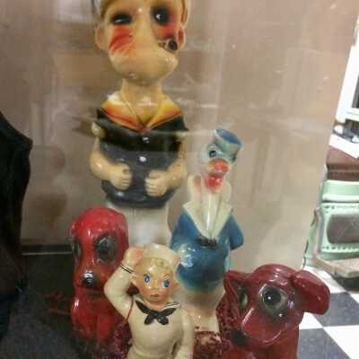 Cast plaster figurines of cartoon characters won from a Beach or Carnival, prior 2015