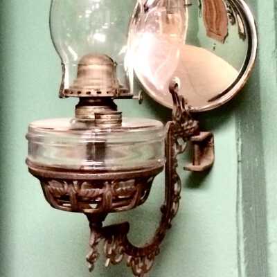 Kerosene lamps and bracket from 1813 9th street, c. 1900