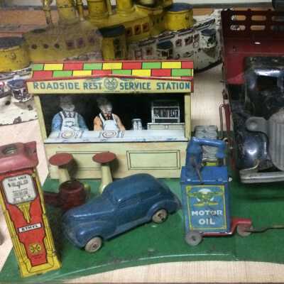 Toy Roadside Rest Service Station with cars and accessories, c. 1930s