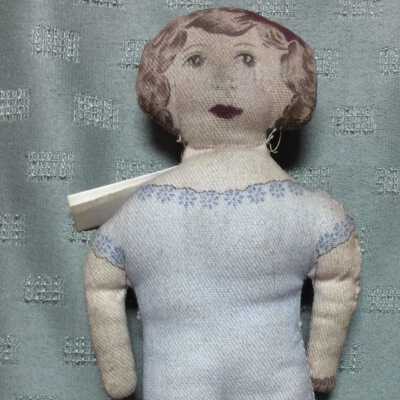 Cloth doll with printed underclothes, face, & hair, c. 1910