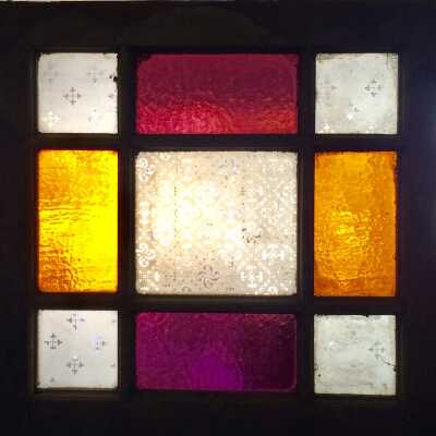 Multi-pane Cathedral style glazed window of 2035 Alameda Ave, c. 1890