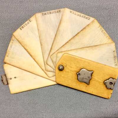 memo pad with metal emblem and ivory cover of the Forsyth family, c. 1870s