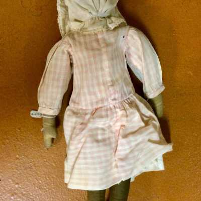 B: Back of doll B