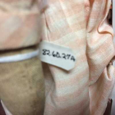 Doll A number tag