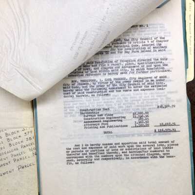 Folder and report re. Bay Farm Island sewer assessment, 1948-1957
