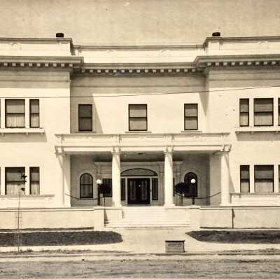 Photo postcard of main facade Elks Building, early 1900s