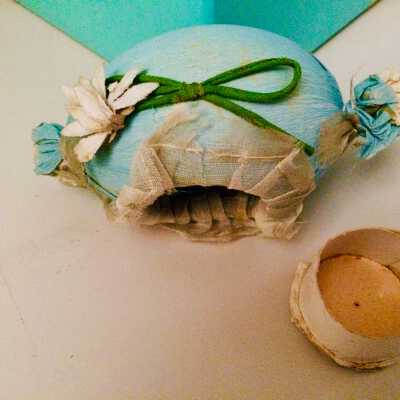 Plaster-of-Paris egg with rabbit head candy container, c. 1912
