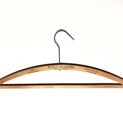 Wooden Hanger advertising Revelation Cleaners, prior 1970