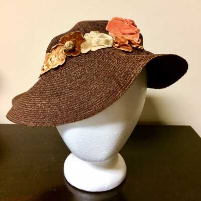 Imitation brown straw hat with silk velvet flowers and orange ribbon, c. 1930s