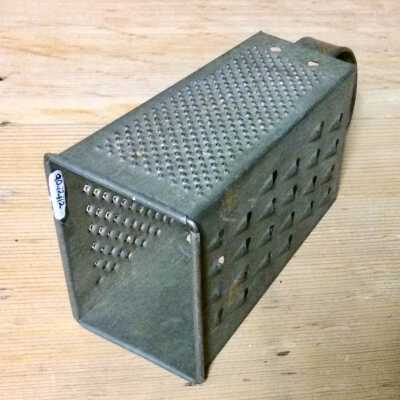 Food grater with four different sides of the Macdonald family, c. 1920s
