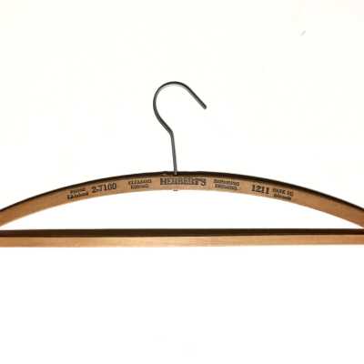 Wooden advertising hangers issued by Herbert's Dry cleaning, prior to 1970