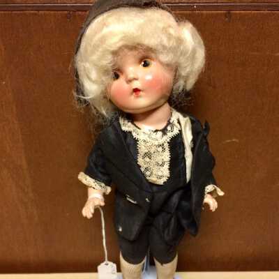 Doll dressed in George Washington style, of the Perkins family, c. 1930s