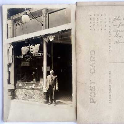Photo postcards J.F. Hanson in front of his cigar & tobacco shop, c. 1915