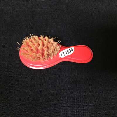 Red plastic miniature hair brush, c. 1930s