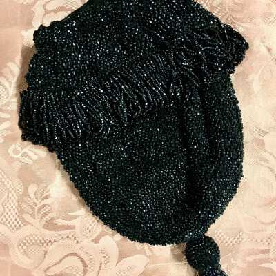 Black beaded drawstring purse with tassel made by Dr. Edith Meyers, c. 1920s