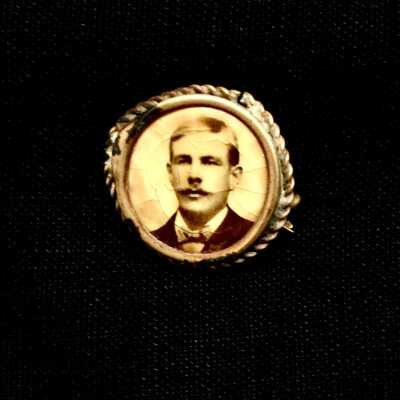 Photo brooch with portrait of John Ekberg, c. 1900