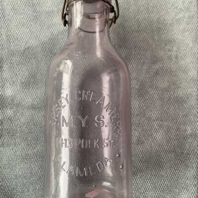 Milk bottle from the Jersey Creamery, with wrong address, pre-1918