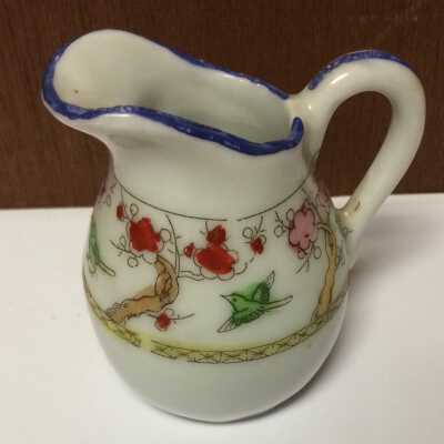Cream pitcher 86.24.7 - F: Side 1