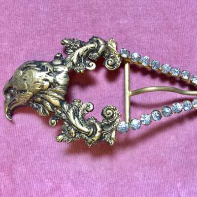 Stamped brass belt buckle with Eagle head motif and rhinestones, early 1900s
