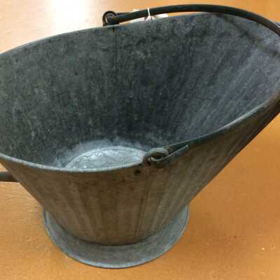 Iron coal shuttle with green painted bail handle, c. 1920