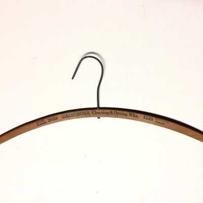 Advertising clothes hanger for California Cleaning and Dyeing Works, c. 1930s