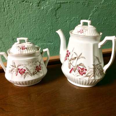 Semi-porcelain Ironstone flowered sugar bown and teapot, c. 1890s