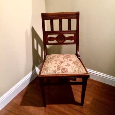 Six Eastlake dining chairs with floral upholstery, late 1880s