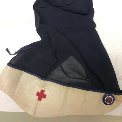 Red Cross Volunteer head cover with pin of Honor Baily Waites, WWI