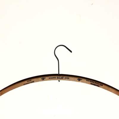 Advertising clothes hanger for Eclat Cleaners and Dyers, prior to 1970